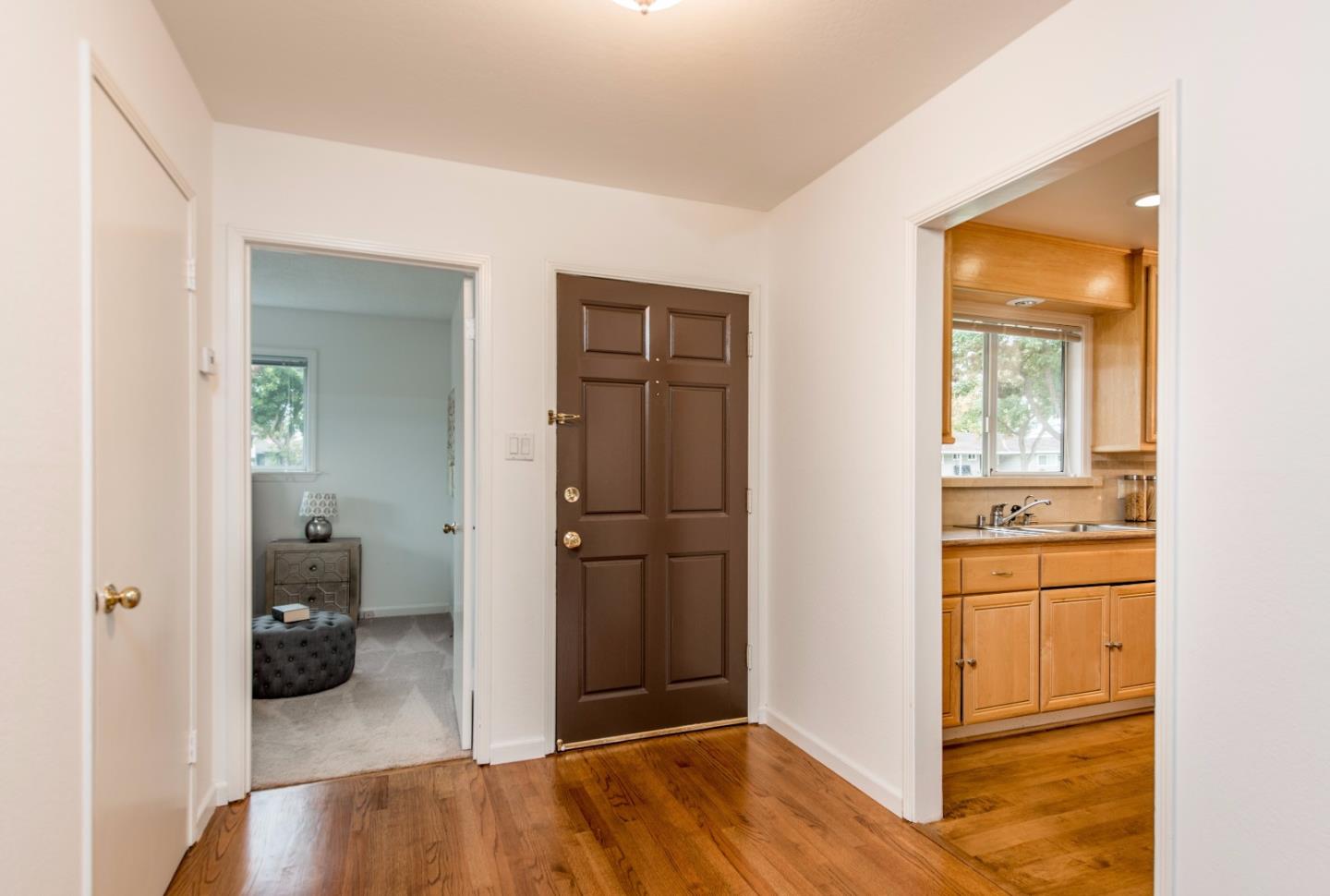1003 Mango Avenue Sunnyvale, CA 94087 - Photo 2 of 23 a view of a bedroom from a hallway