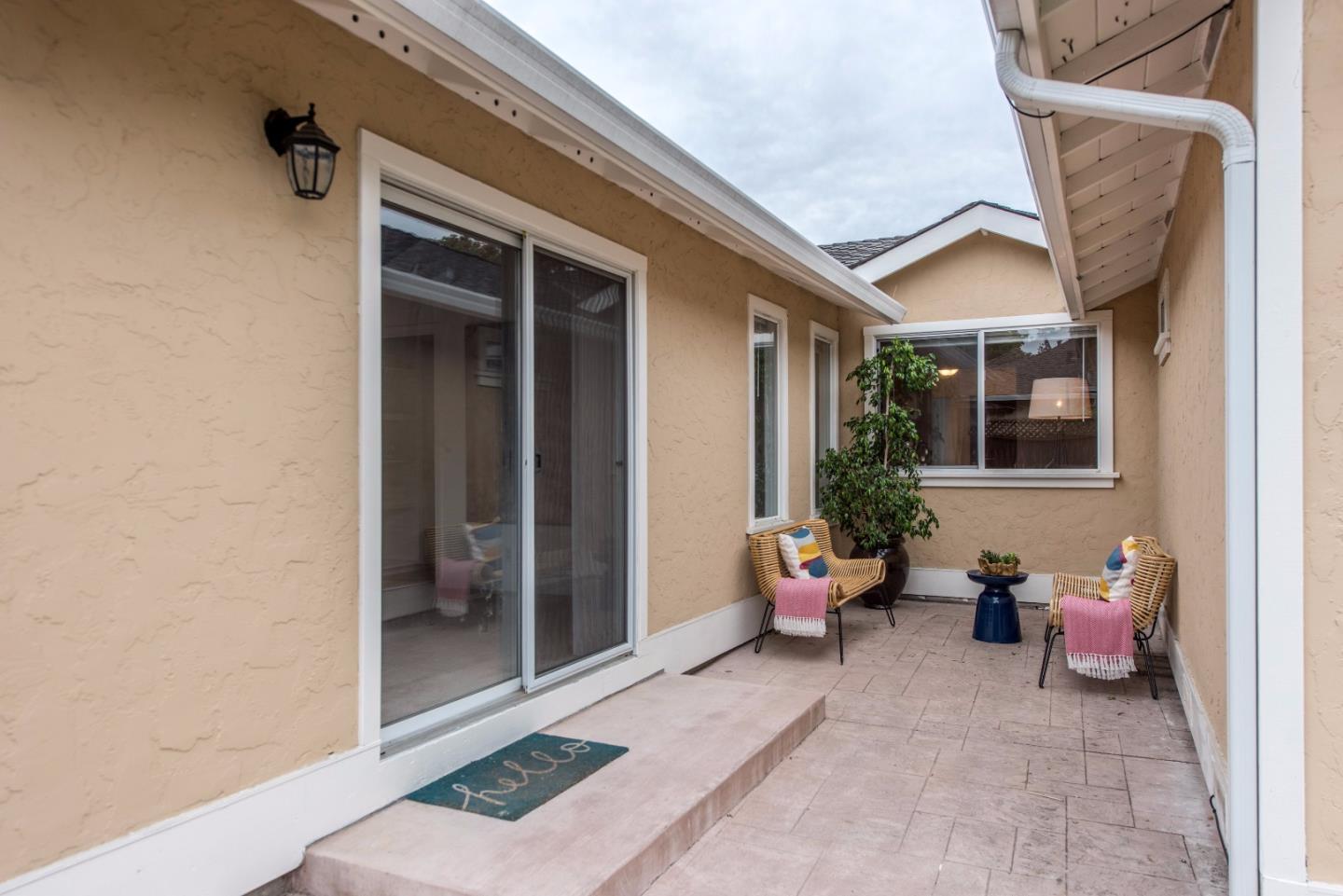 1003 Mango Avenue Sunnyvale, CA 94087 - Photo 21 of 23 a view of a entryway door front of house