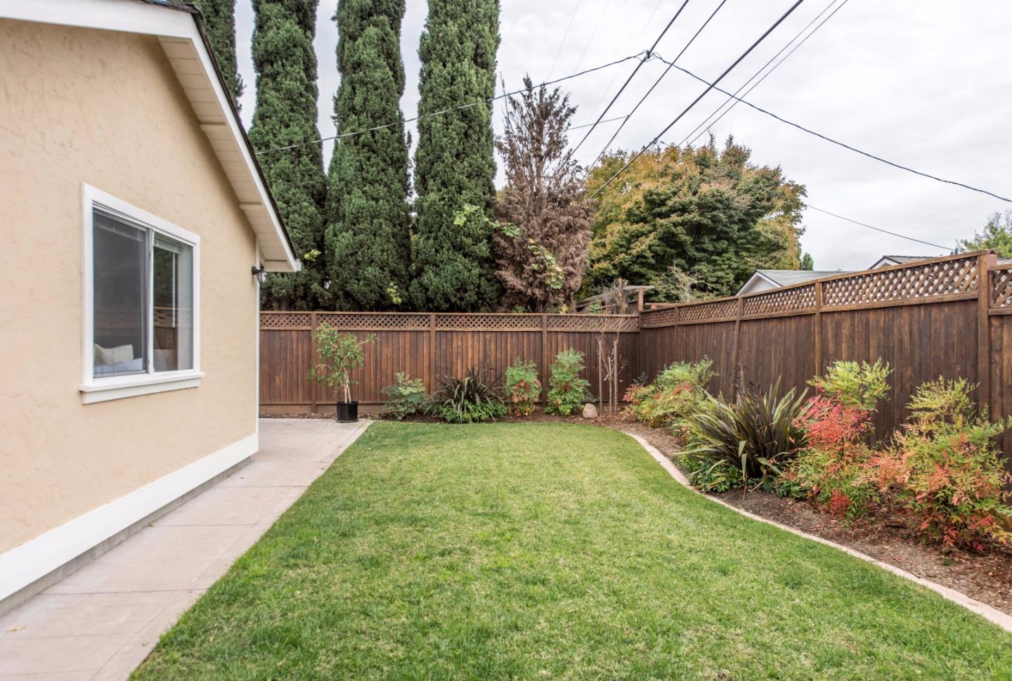 1003 Mango Avenue Sunnyvale, CA 94087 - Photo 22 of 23 a view of a backyard with plants