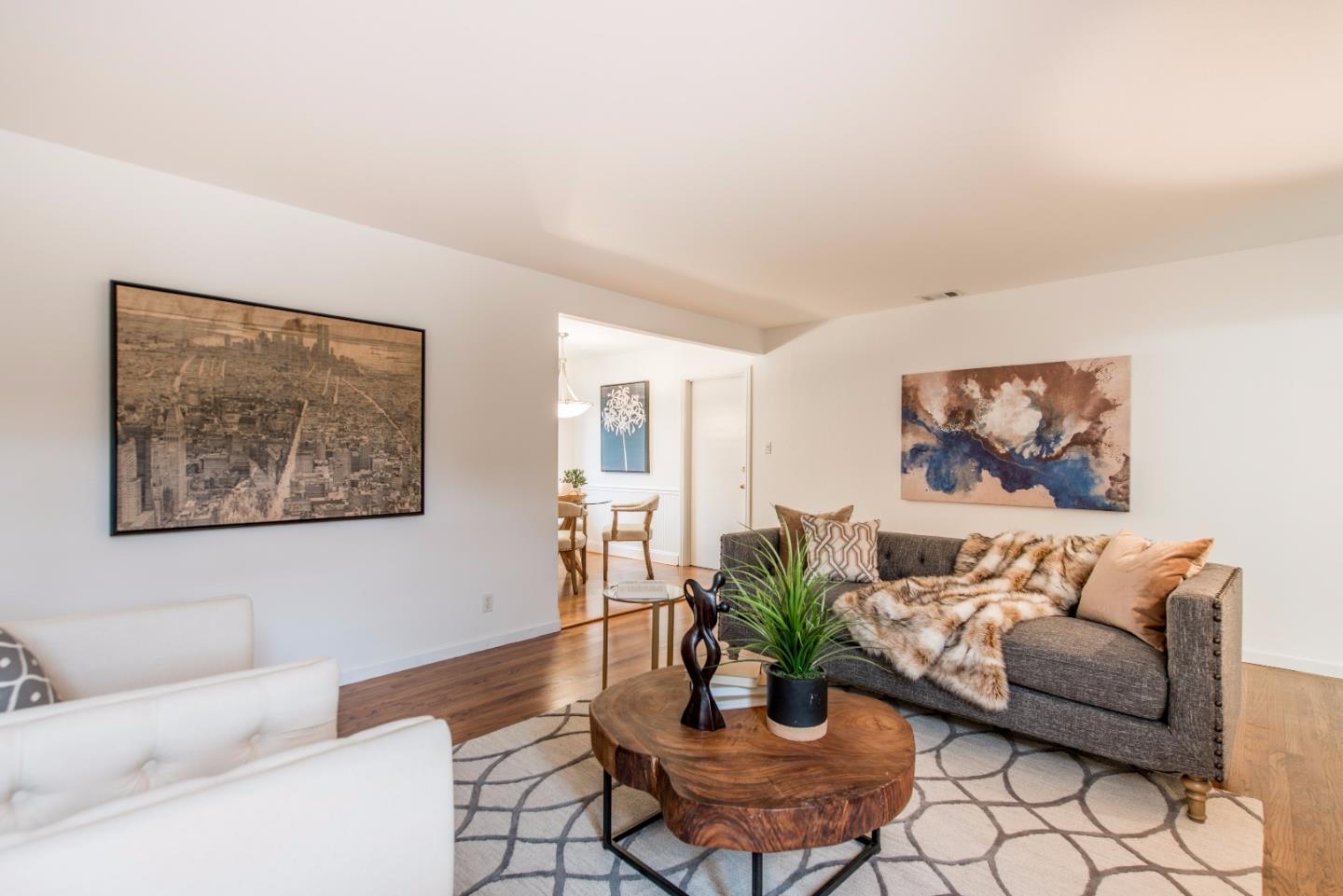 1003 Mango Avenue Sunnyvale, CA 94087 - Photo 5 of 23 a living room with furniture and a potted plant
