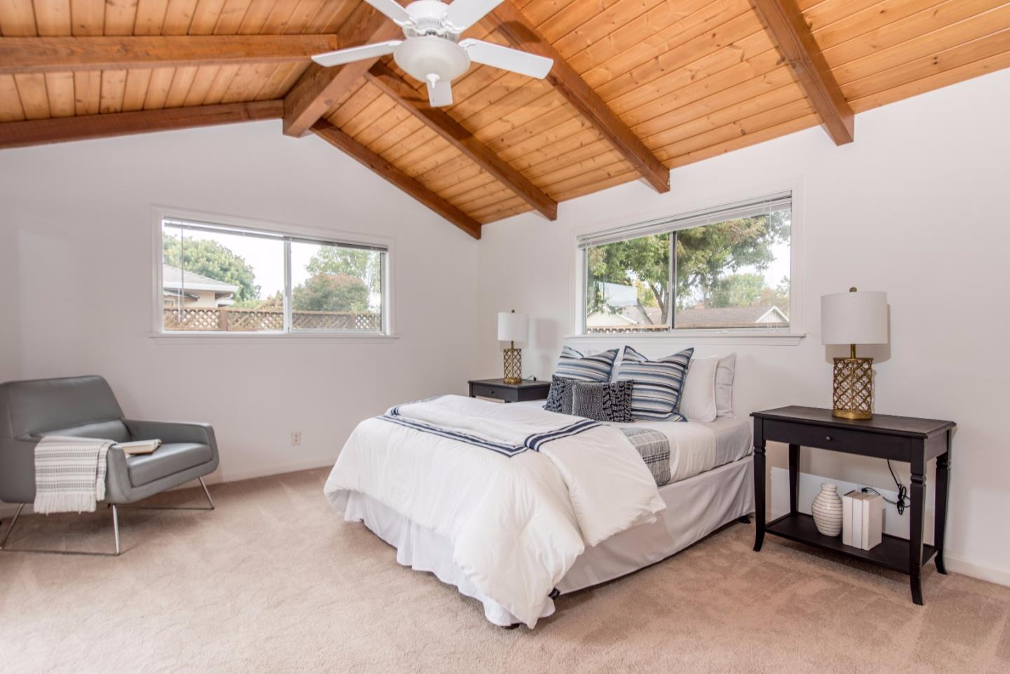 1003 Mango Avenue Sunnyvale, CA 94087 - Photo 10 of 23 a bedroom with a bed and a window