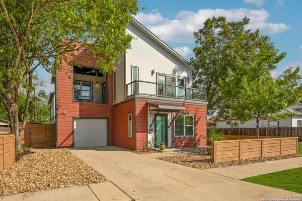 a front view of a house with a porch