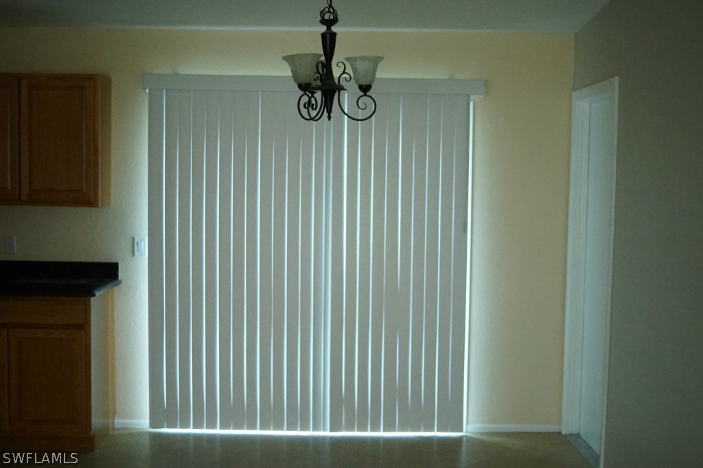 18355 Fern Road Fort Myers, FL 33967 - Photo 4 of 6 a view of a hallway with windows