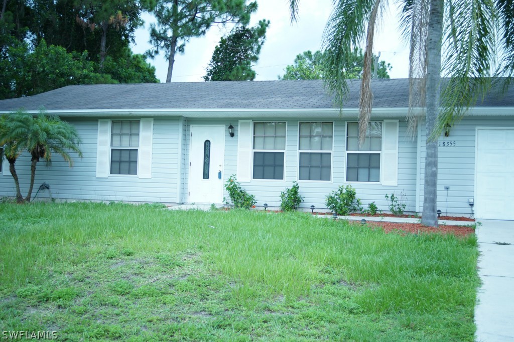 18355 Fern Road Fort Myers, FL 33967 - Photo 6 of 6 a front view of a house with garden