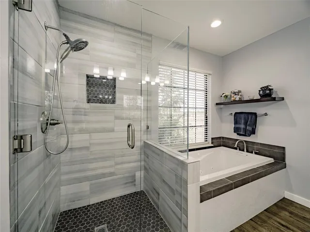 a bathroom with a sink and a shower