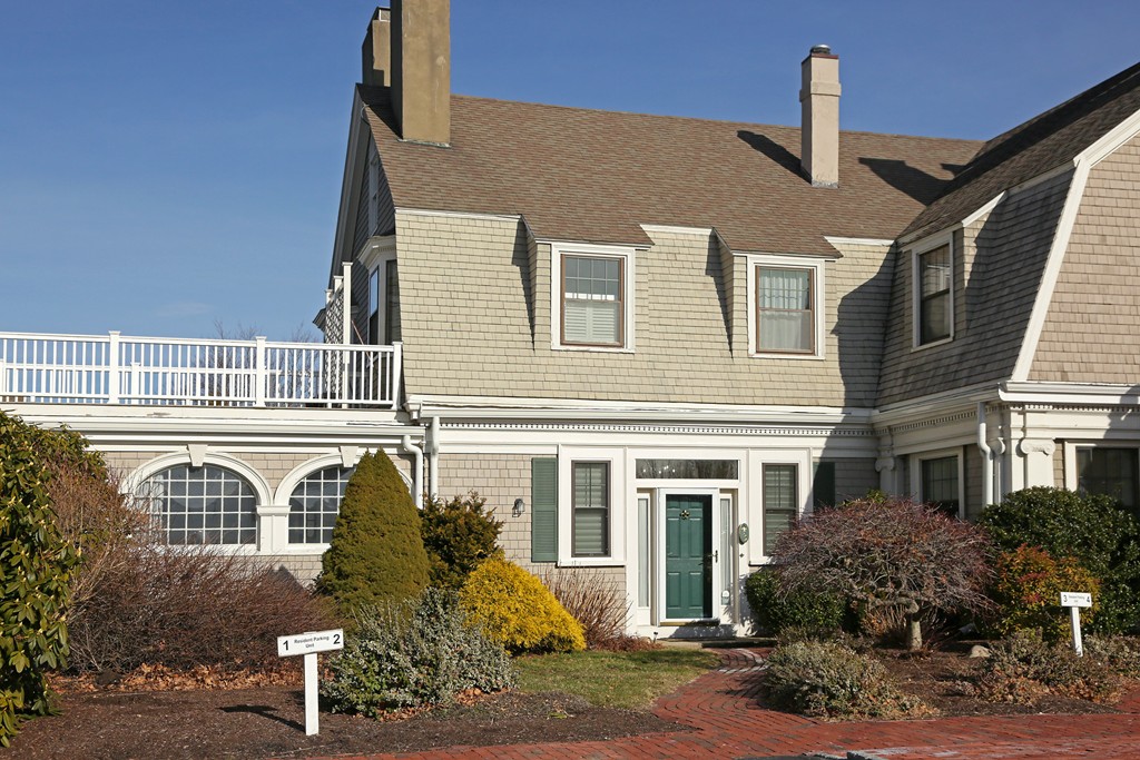74 Branch Street, Unit 3 Scituate, MA 02066 - Photo 1 of 21 a front view of a house with a yard