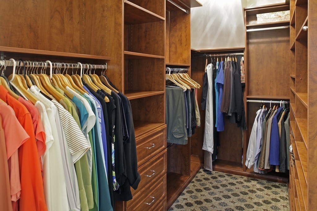 74 Branch Street, Unit 3 Scituate, MA 02066 - Photo 13 of 21 a view of walk in closet with clothes and shoes