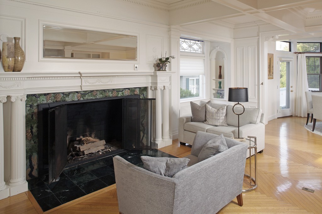 74 Branch Street, Unit 3 Scituate, MA 02066 - Photo 4 of 21 a living room with furniture and a fireplace