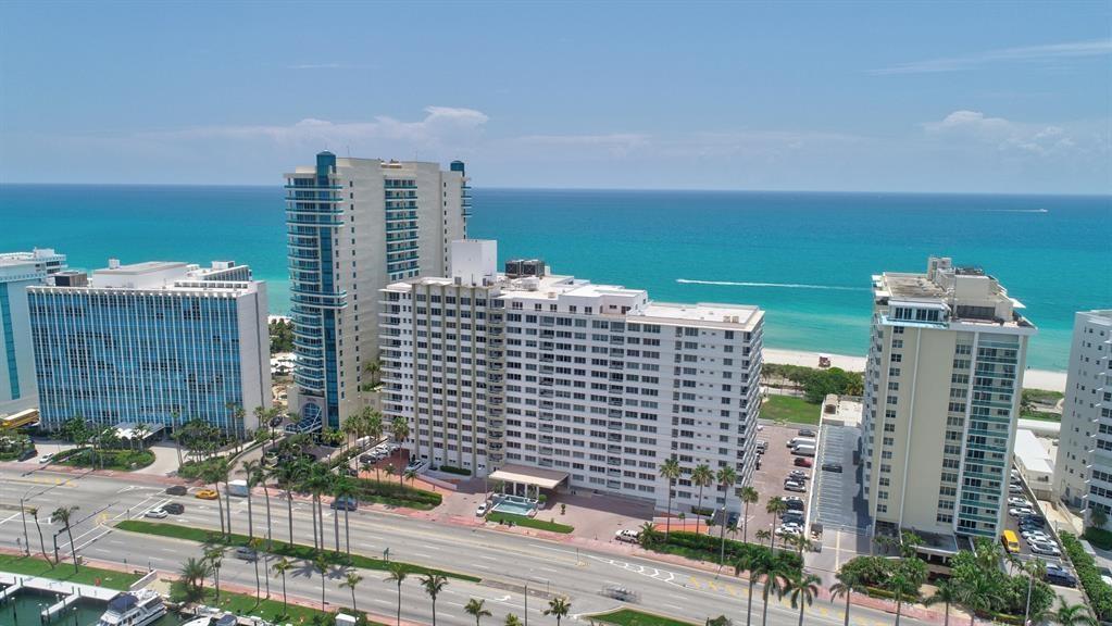 5005 Collins Avenue, Unit PH6 Miami Beach, FL 33140 - Photo 1 of 34 a view of a city with tall buildings