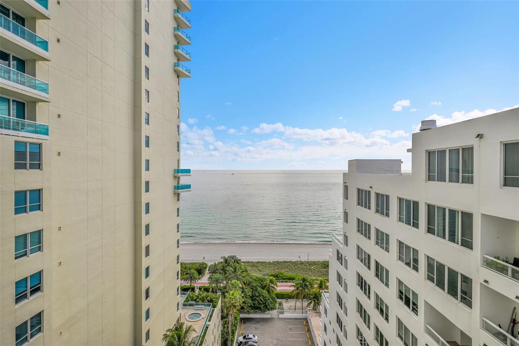 5005 Collins Avenue, Unit PH6 Miami Beach, FL 33140 - Photo 11 of 34 a view of a lake with a building