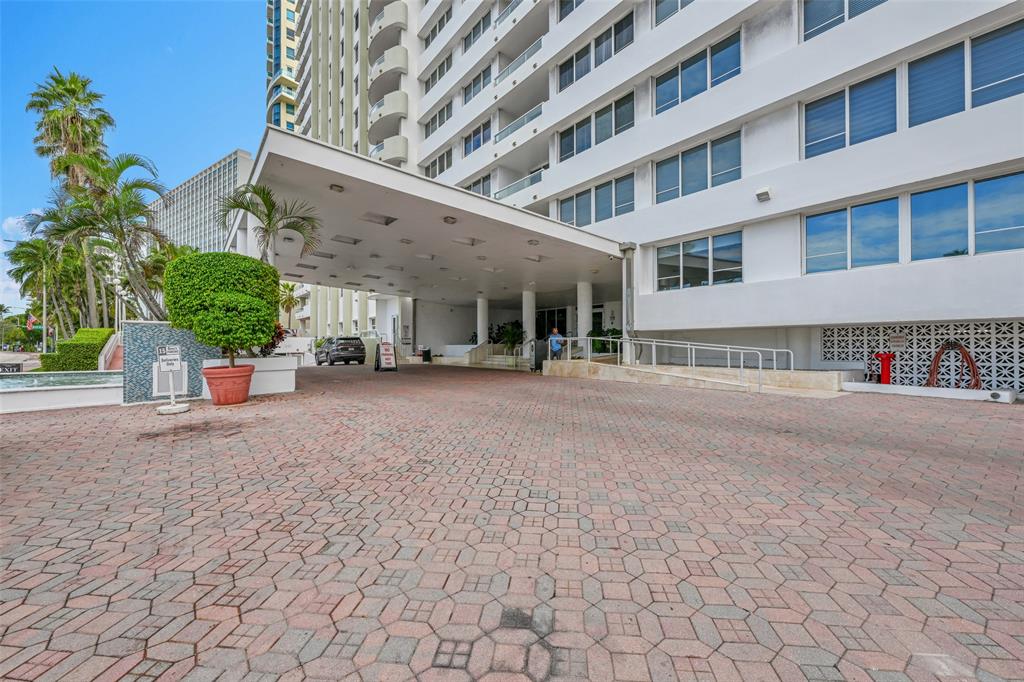5005 Collins Avenue, Unit PH6 Miami Beach, FL 33140 - Photo 22 of 34 a view of a building with a street