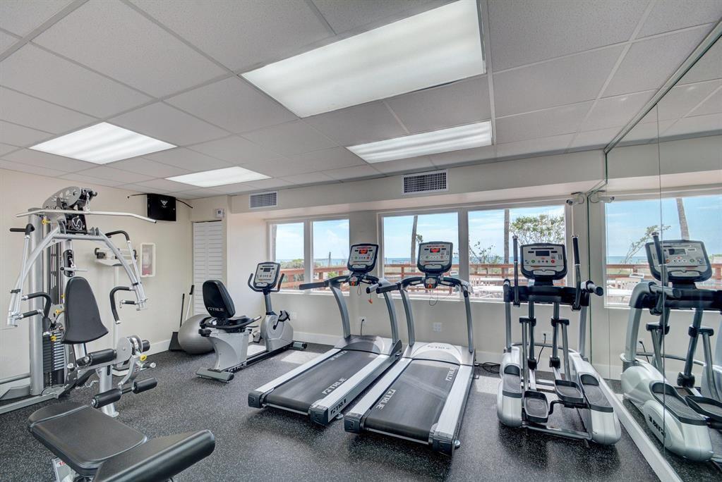 5005 Collins Avenue, Unit PH6 Miami Beach, FL 33140 - Photo 29 of 34 a view of a room with gym equipment