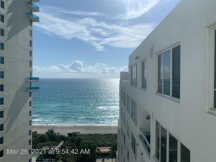 5005 Collins Avenue, Unit PH6 Miami Beach, FL 33140 - Photo 31 of 34 a view of ocean from a balcony