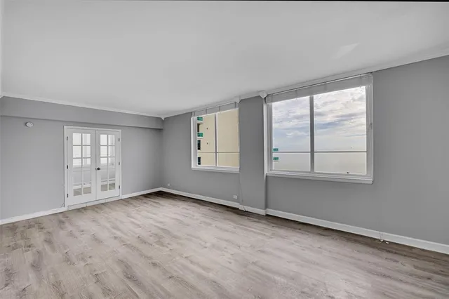 an empty room with windows