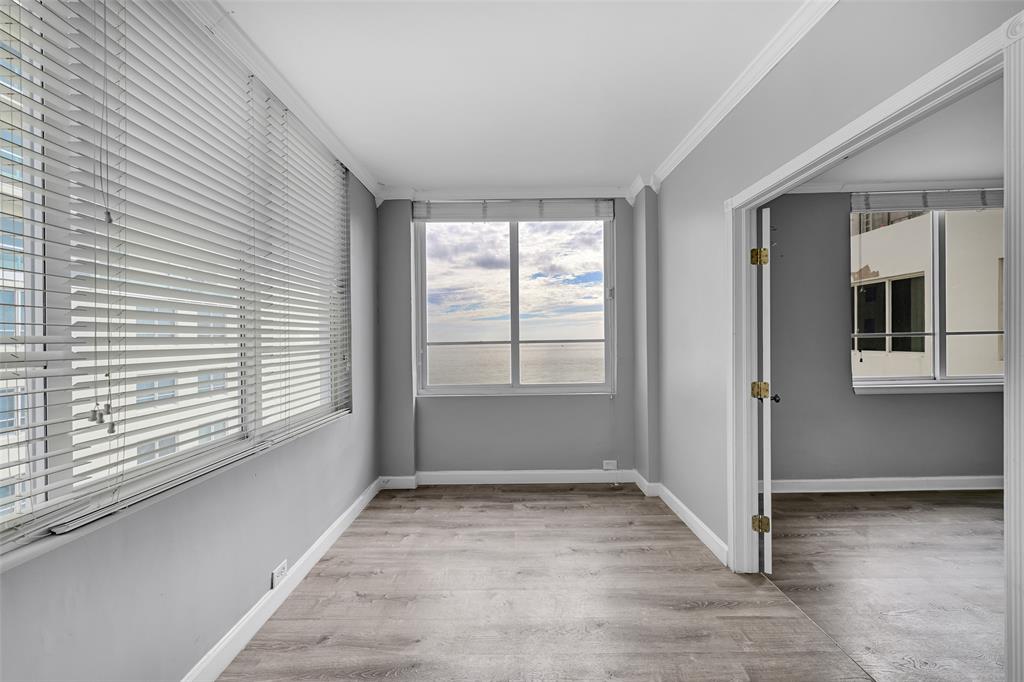 5005 Collins Avenue, Unit PH6 Miami Beach, FL 33140 - Photo 10 of 34 a view of an empty room with a window