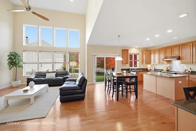 a living room with furniture fireplace and a flat screen tv