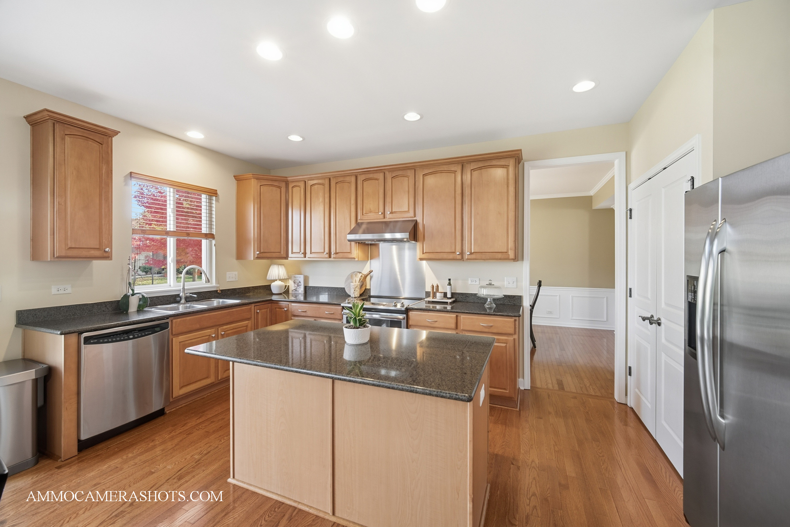 1329 Turnberry Lane Mundelein, IL 60060 - Photo 14 of 33 a kitchen with granite countertop a sink stainless steel appliances and cabinets