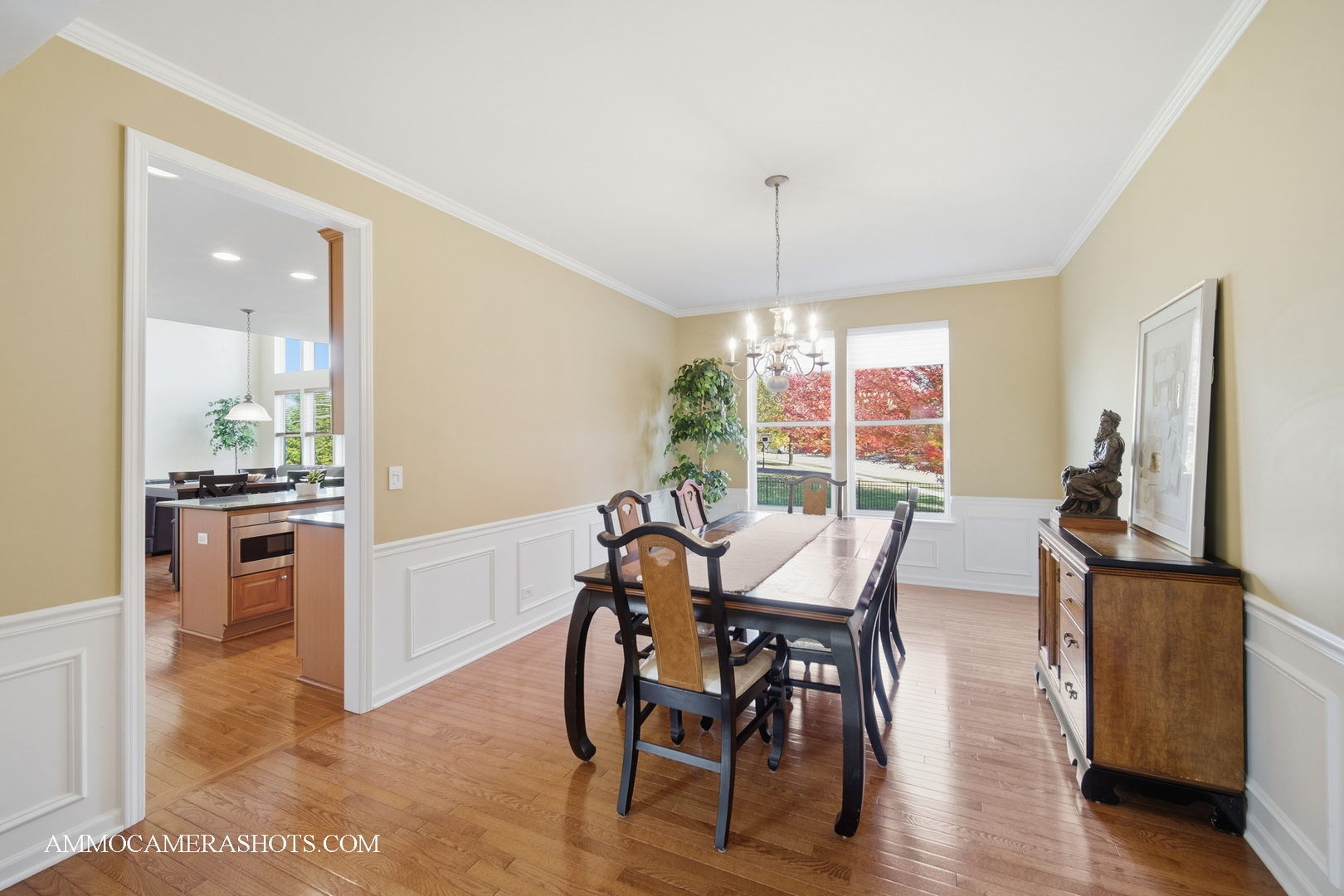 1329 Turnberry Lane Mundelein, IL 60060 - Photo 8 of 33 a view of a dining room with furniture window and wooden floor