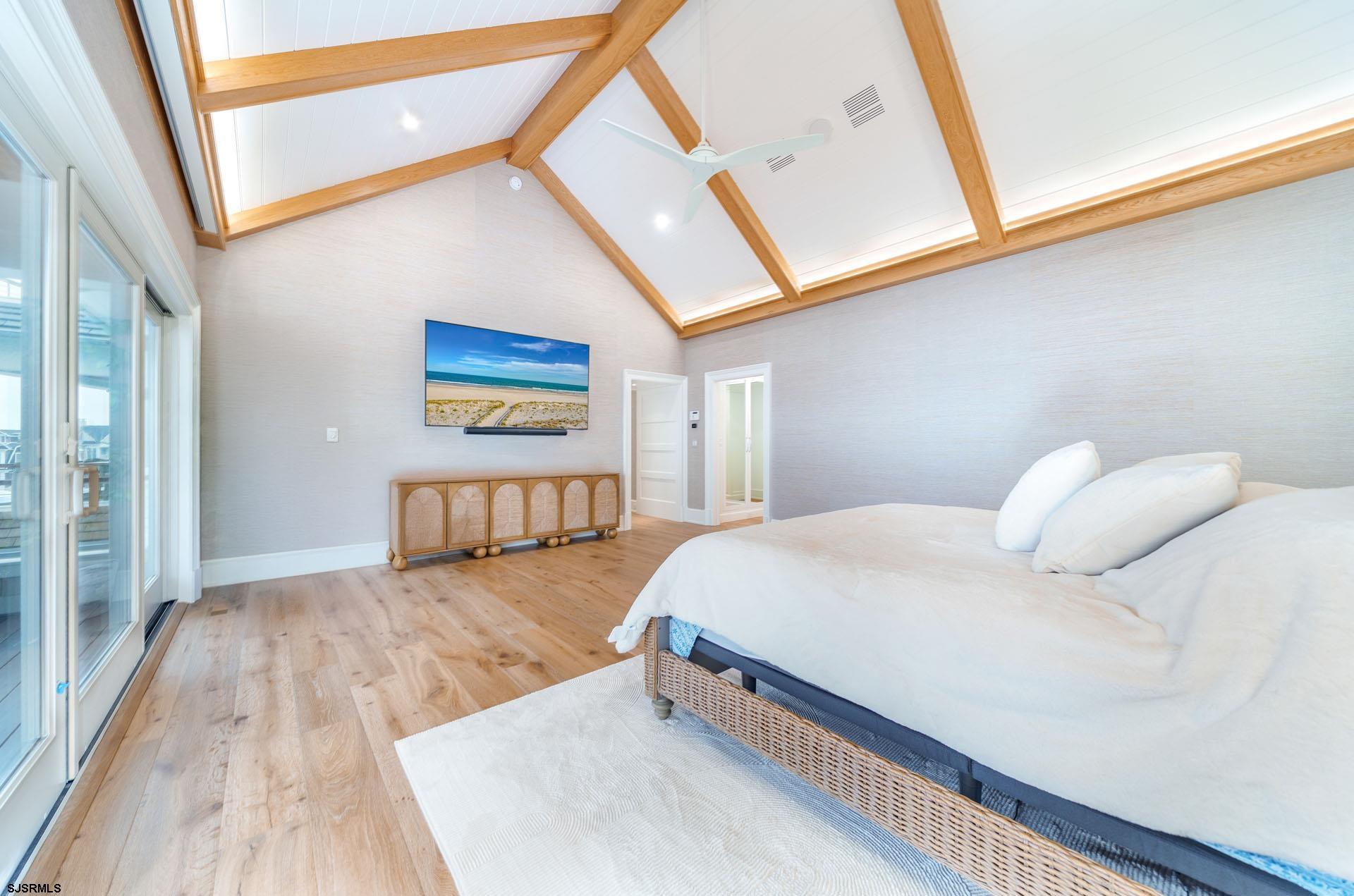 55 Walnut Road Ocean City, NJ 08226 - Photo 59 of 97 a bedroom with a large bed and a window