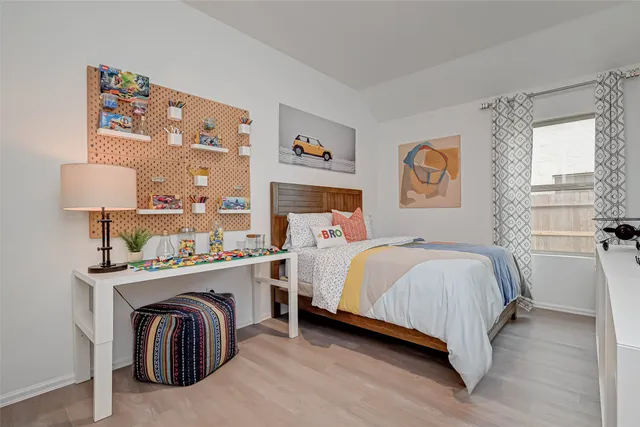 a bedroom with a bed and closet