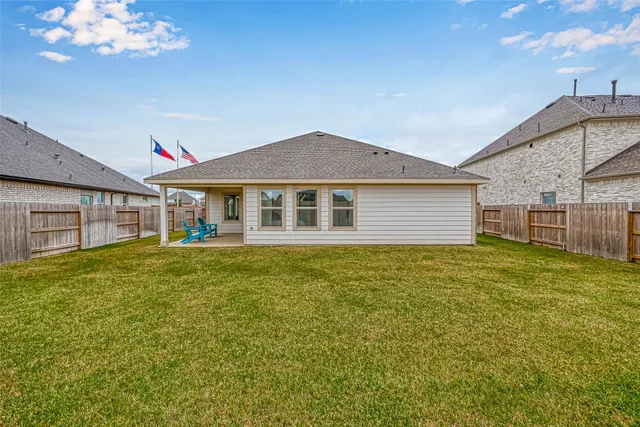 a house view with a garden space