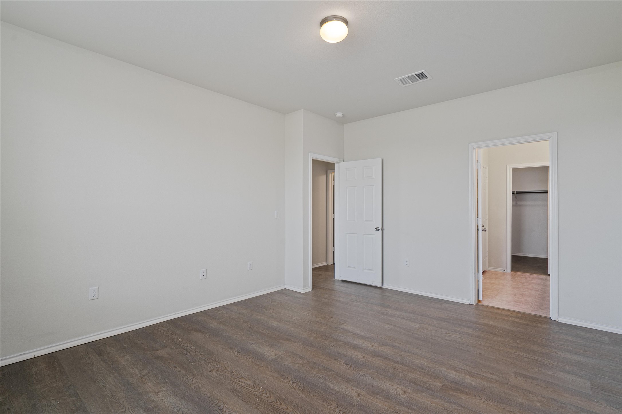146 Russet Trail Georgetown, TX 78628 - Photo 16 of 37 wooden floor in an empty room