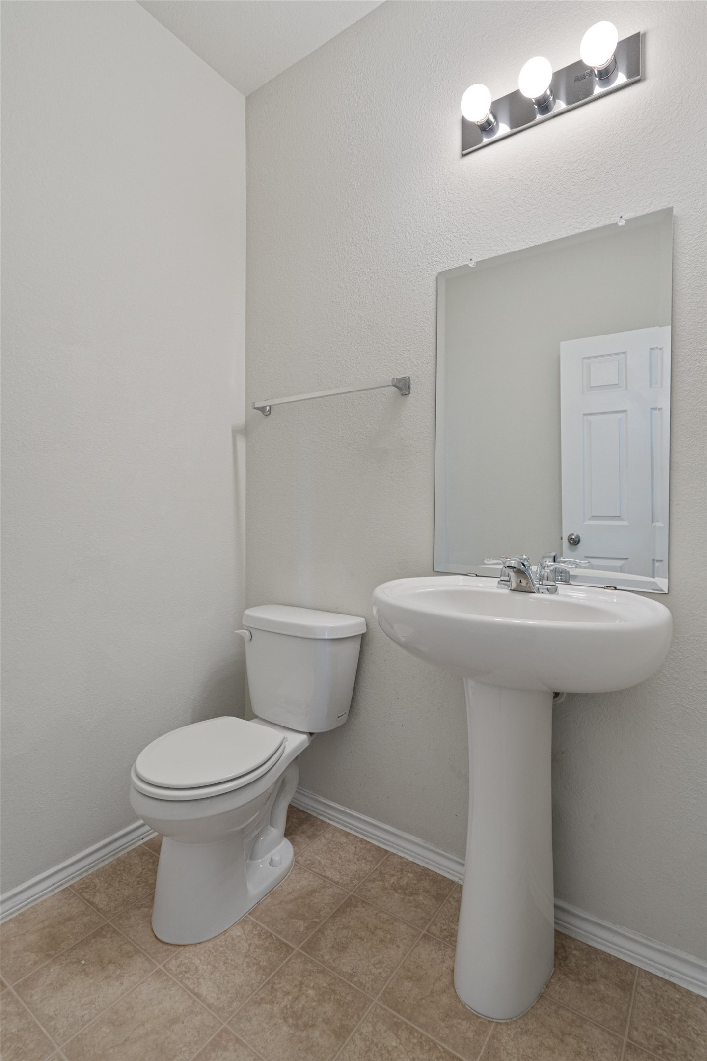146 Russet Trail Georgetown, TX 78628 - Photo 20 of 37 a bathroom with a sink toilet and a mirror