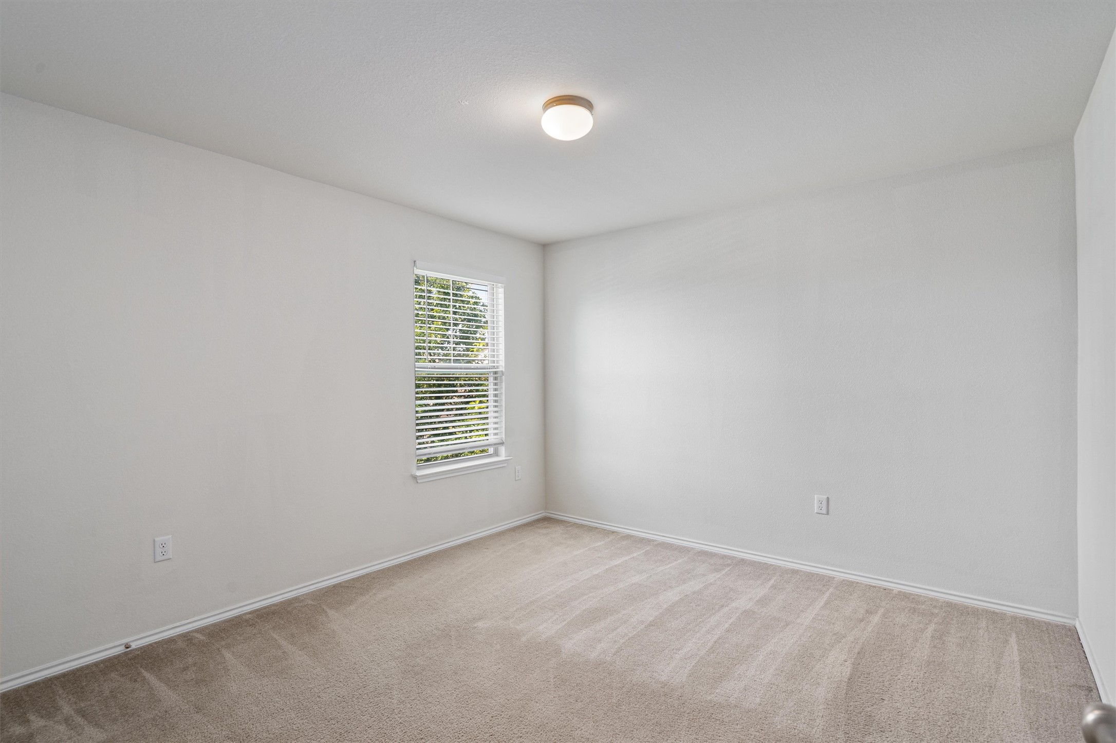 146 Russet Trail Georgetown, TX 78628 - Photo 24 of 37 a view of an empty room with a window