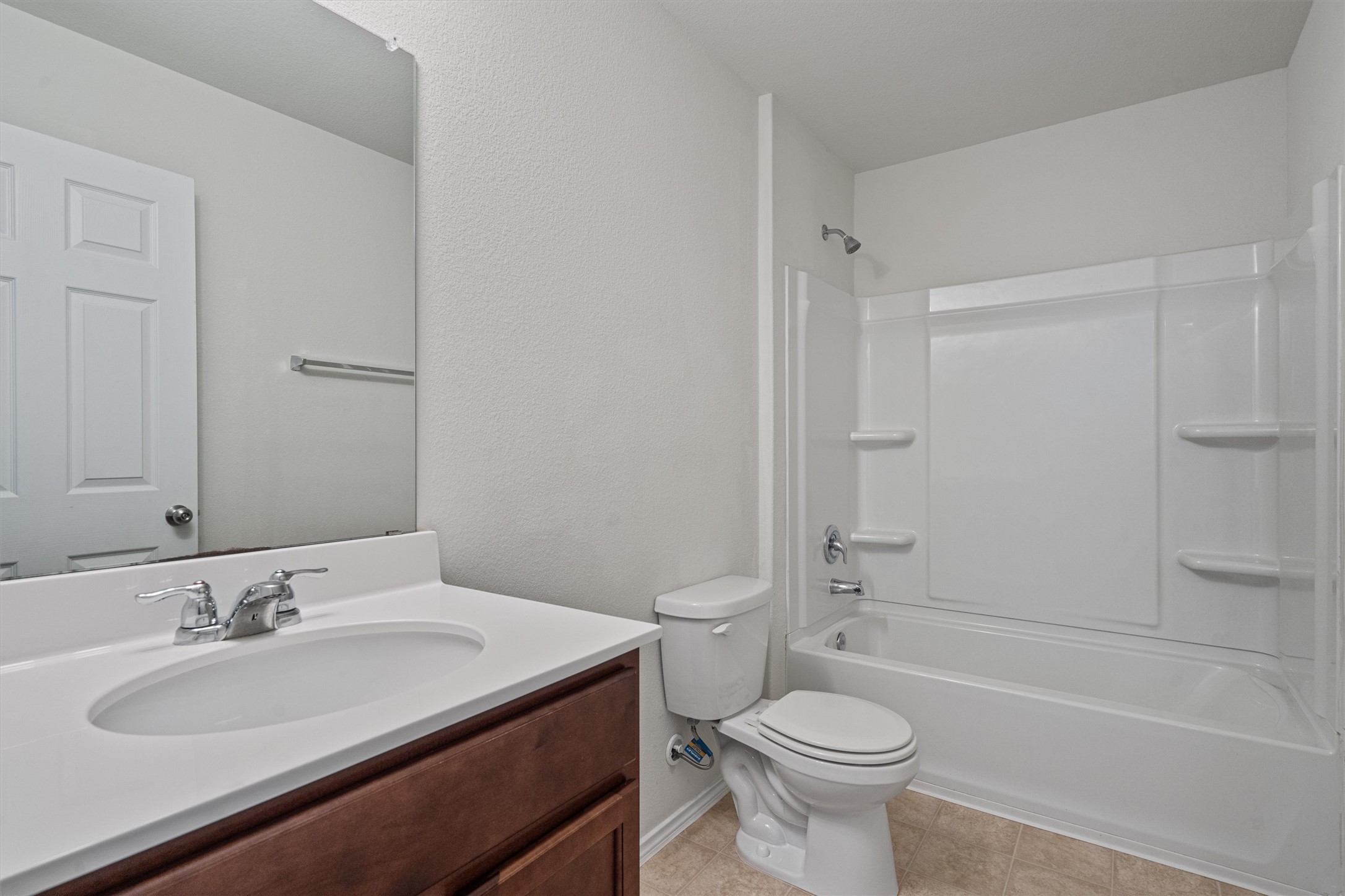 146 Russet Trail Georgetown, TX 78628 - Photo 30 of 37 a bathroom with a sink toilet vanity and shower