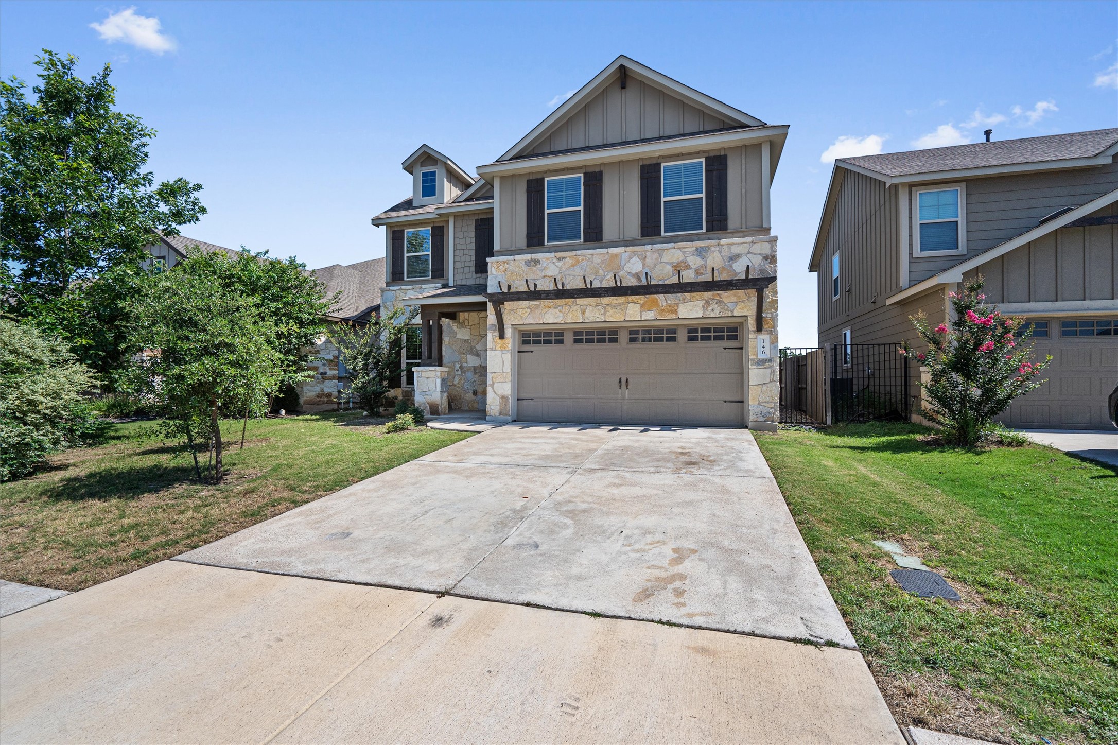 146 Russet Trail Georgetown, TX 78628 - Photo 3 of 37 a front view of a house with a yard and garage