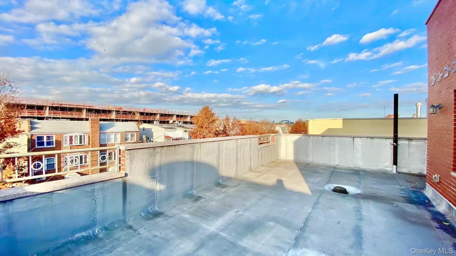 108-38 41st Avenue, Unit 4A Queens, NY 11368 - Photo 9 of 10 a view of outdoor space with swimming pool