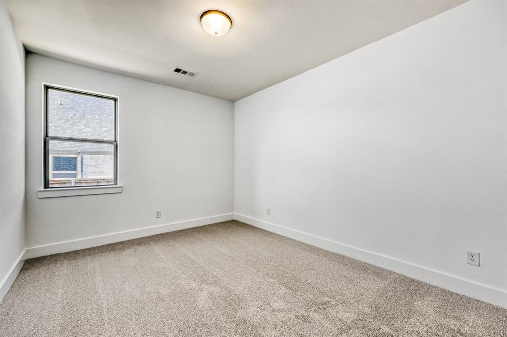 147 Derrett Lane Rhome, TX 76078 - Photo 9 of 28 Unfurnished room featuring baseboards and light colored carpet