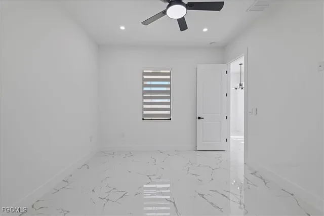 en empty room with windows