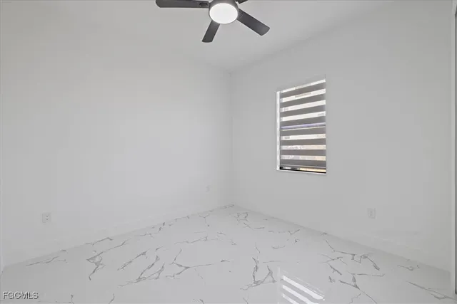 en empty room with windows