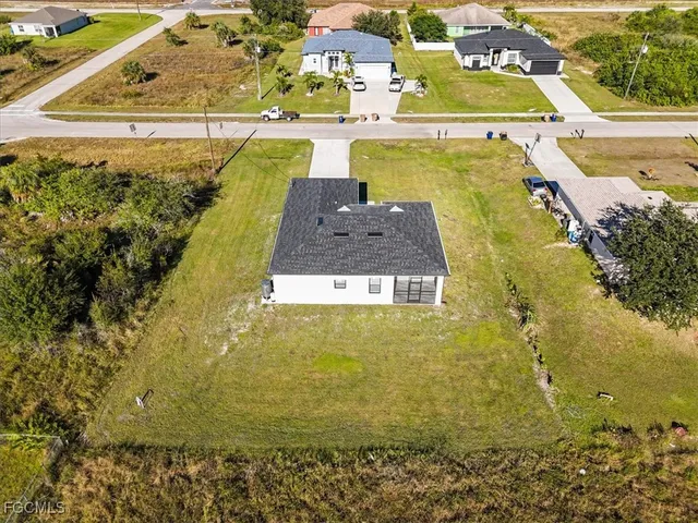 a view of a swimming pool with an ocean view