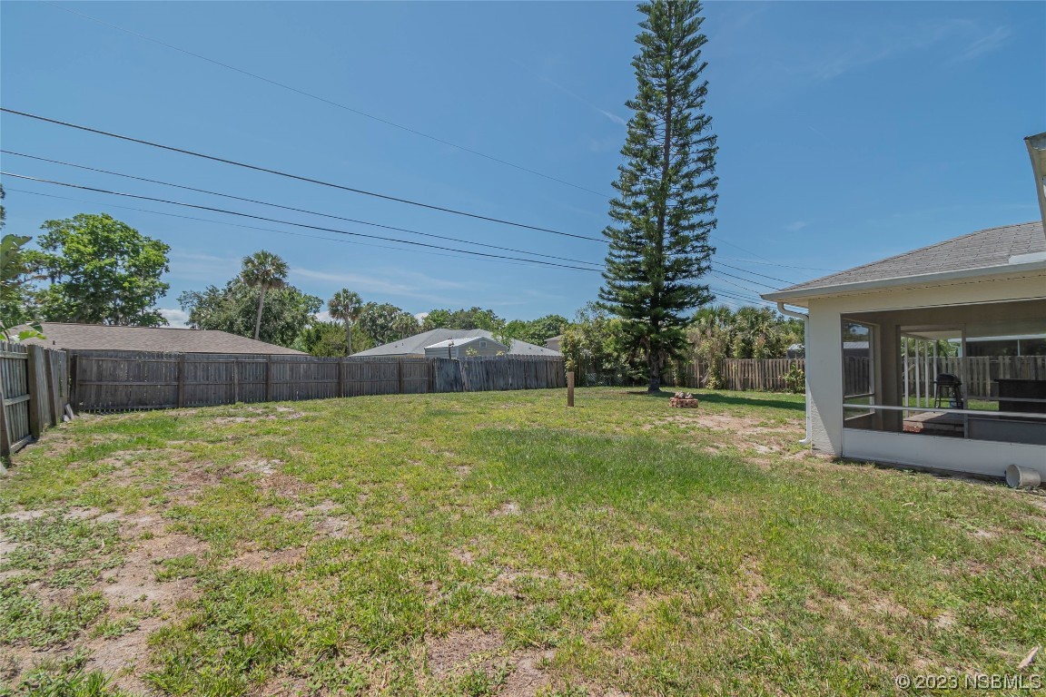 2716 Juniper Drive Edgewater, FL 32141 - Photo 3 of 30 a backyard of a house