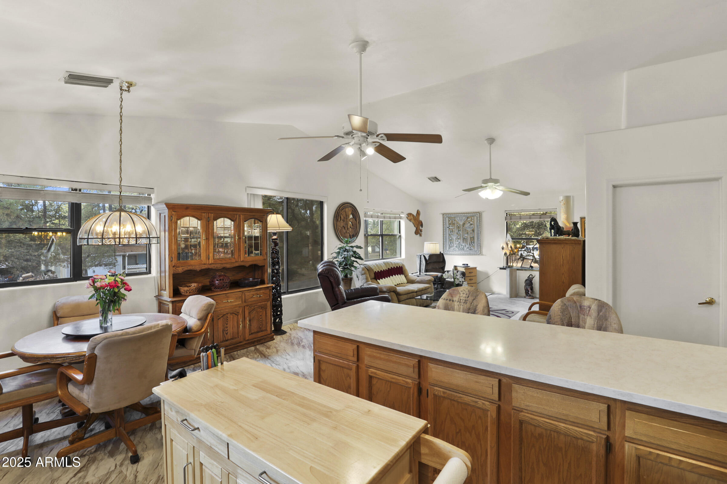 401 East Alpine Drive Payson, AZ 85541 - Photo 16 of 30 a very nice looking living room with a large window and kitchen view