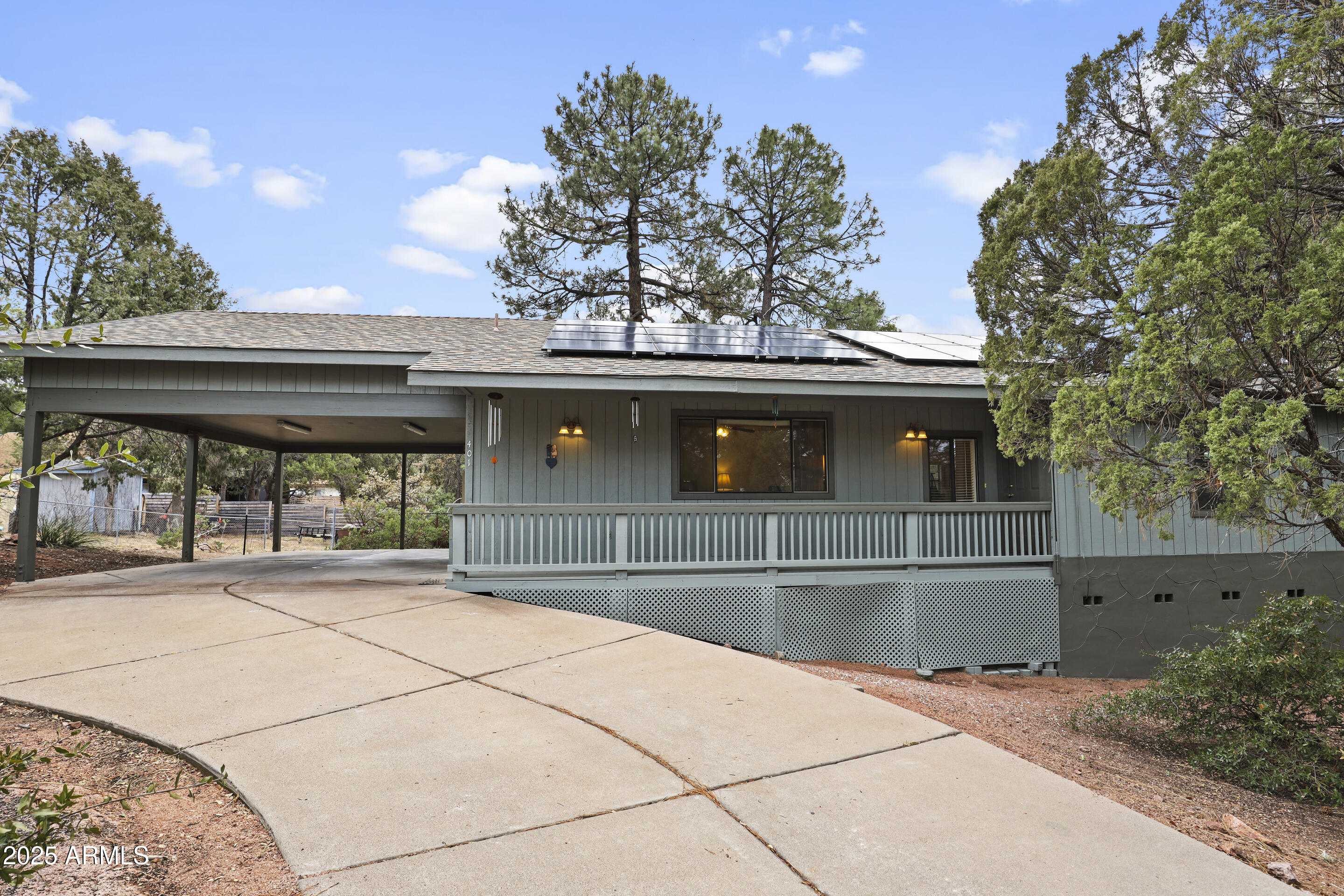 401 East Alpine Drive Payson, AZ 85541 - Photo 2 of 30 a backyard of a house with table and chairs