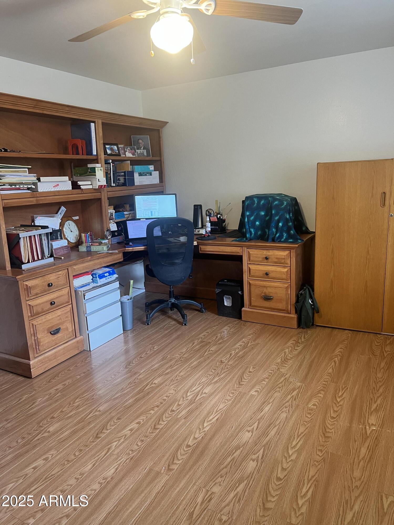 401 East Alpine Drive Payson, AZ 85541 - Photo 23 of 30 a room with furniture and a wooden floor