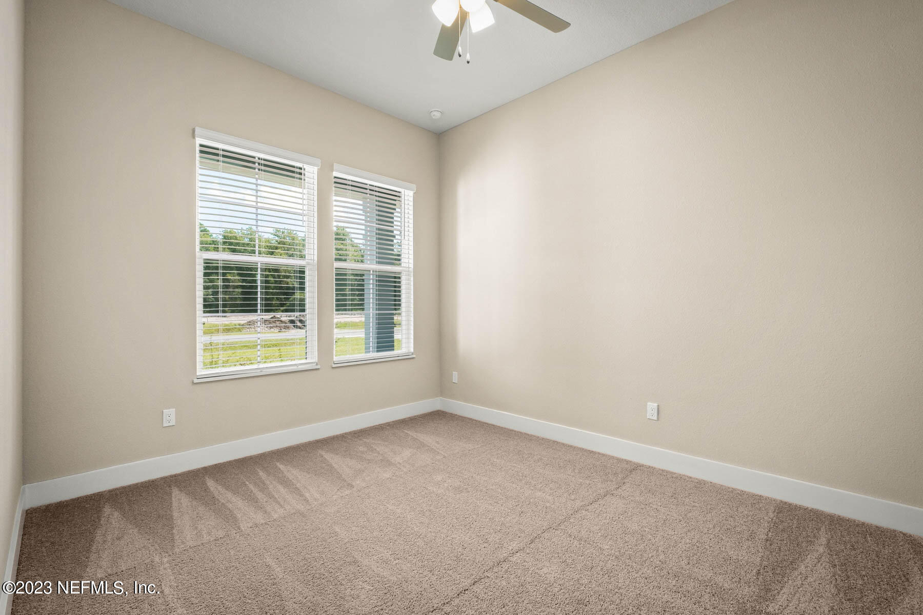 36426 Pitch Lane Hilliard, FL 32046 - Photo 13 of 14 an empty room with a window