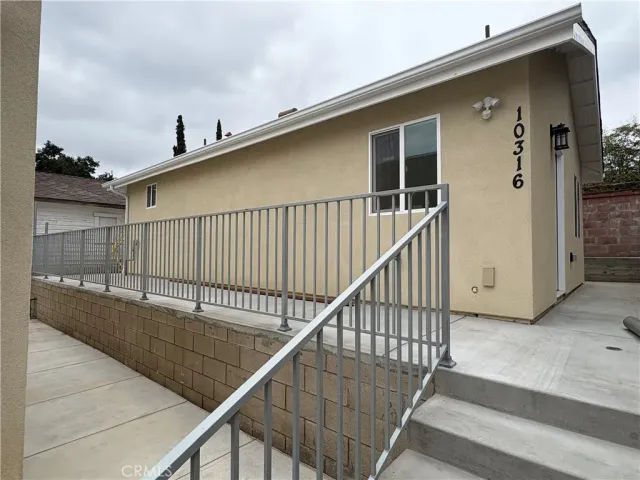 a front view of a house with a garage