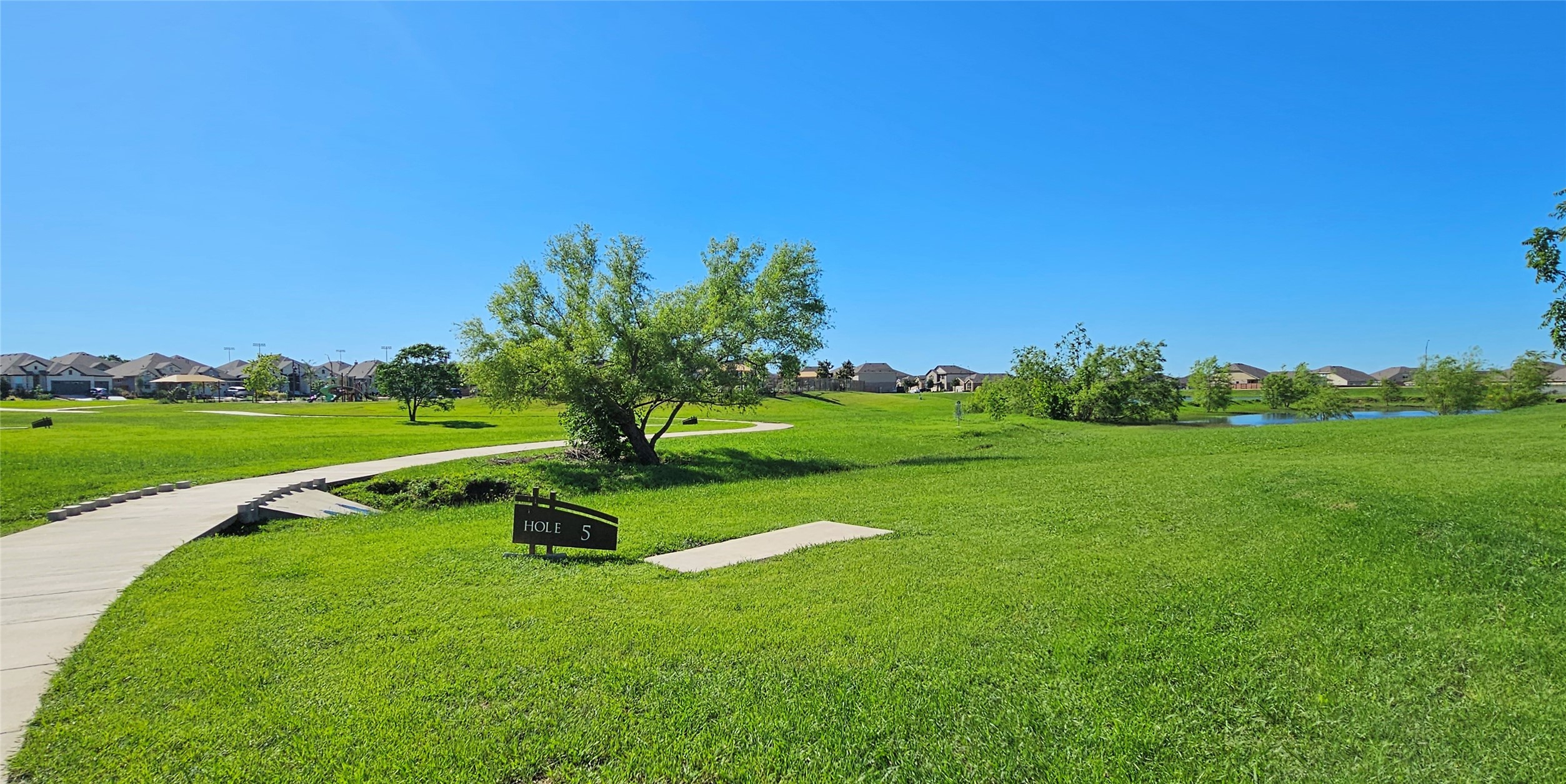 5436 Vanner Path Georgetown, TX 78626 - Photo 1 of 1 Sidewalk to the Clubhouse from Vanner Path