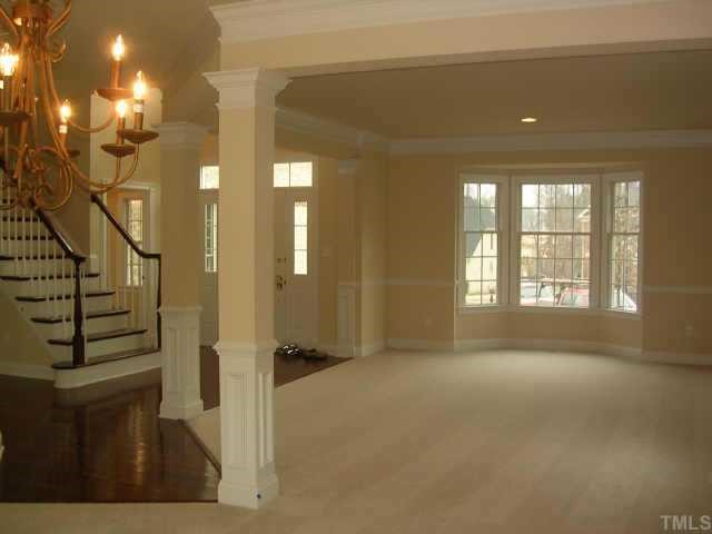 11726 Broadfield Court Raleigh, NC 27617 - Photo 2 of 6 a view of livingroom with window