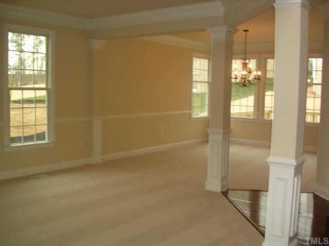 11726 Broadfield Court Raleigh, NC 27617 - Photo 3 of 6 a view of an empty room with a window
