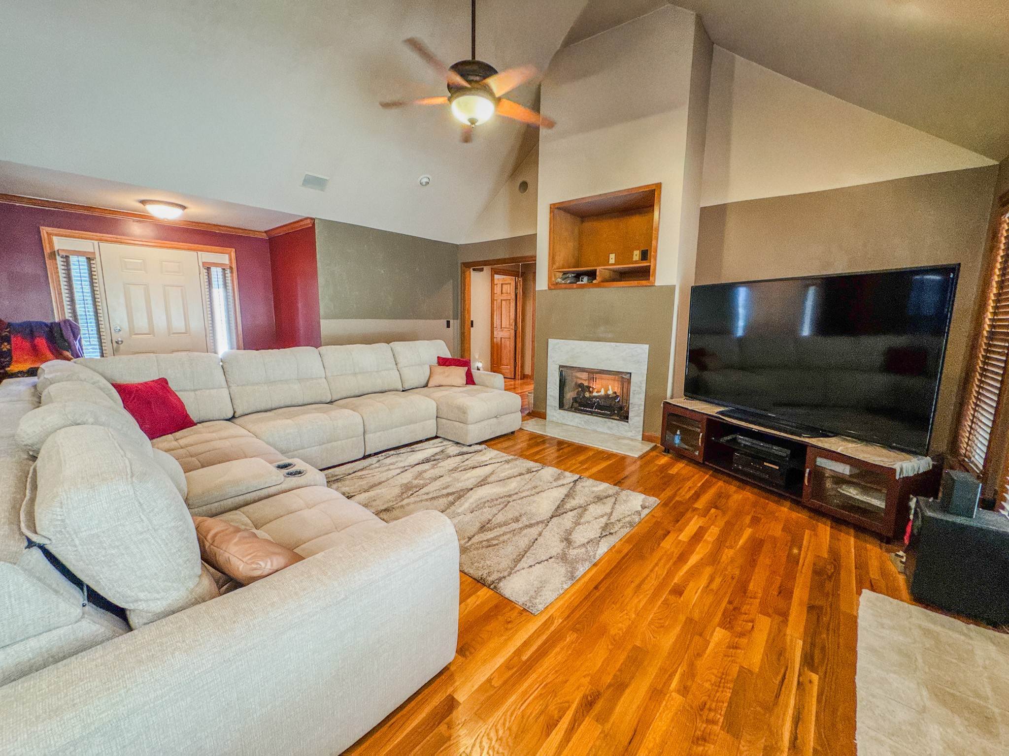410 Britton Hollow Road Pulaski, TN 38478 - Photo 13 of 59 a living room with a flat screen tv and a fireplace