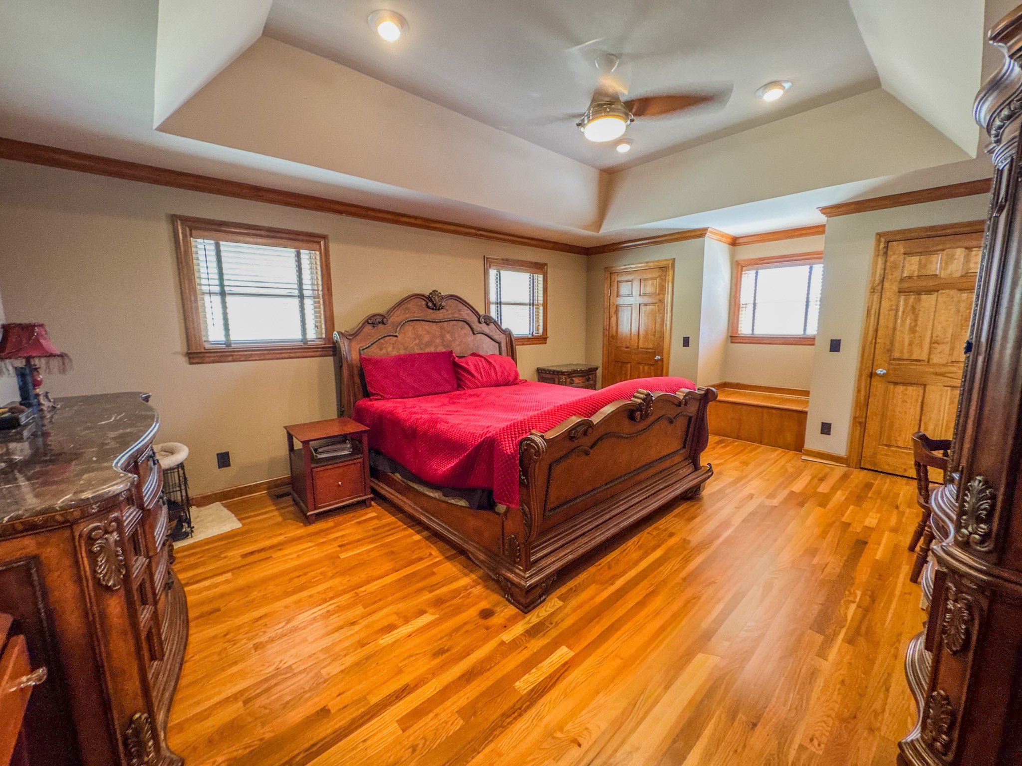410 Britton Hollow Road Pulaski, TN 38478 - Photo 15 of 59 a bedroom with a bed and wooden floor