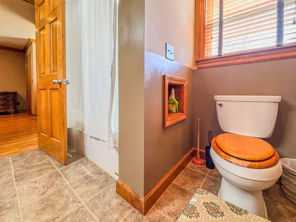 an aerial view of a house with yard and outdoor space