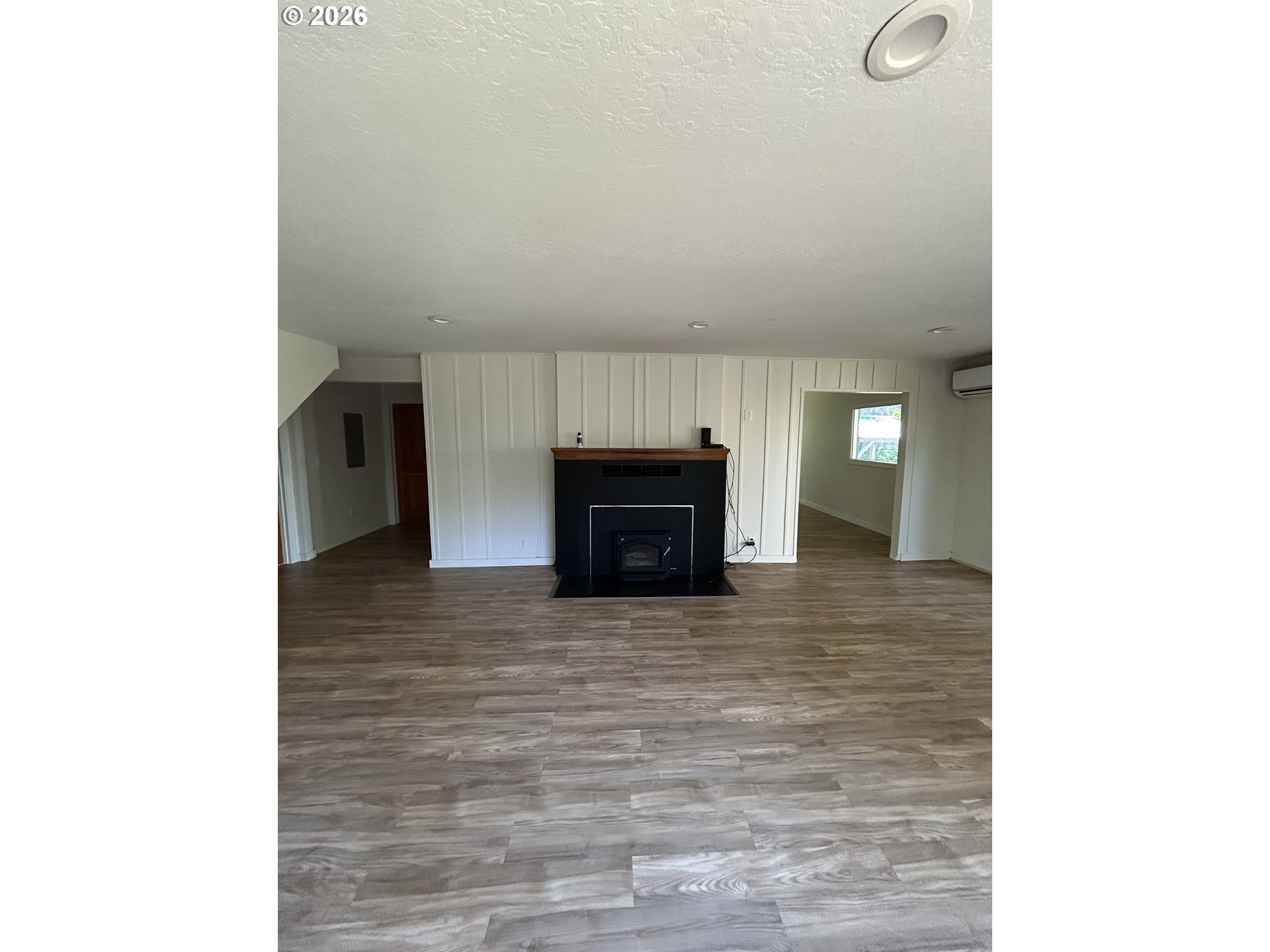 62356 Olive Barber Road Coos Bay, OR 97420 - Photo 19 of 34 a living room with a fireplace