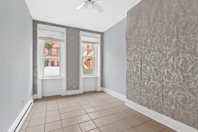 a view of an empty room and window