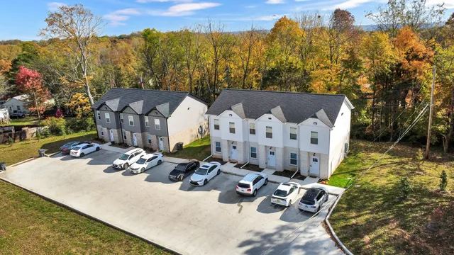 a view of a chairs setting on the roof deck
